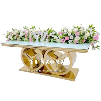 ভালো দাম বেঞ্জ বেস সহ আধুনিক সোনার আয়তক্ষেত্রাকার ডাইনিং টেবিল বহিরঙ্গন এবং হোটেল ব্যবহারের জন্য বিলাসবহুল বিবাহের ইভেন্টের আসবাবপত্র গ্লাস / এমডিএফ শীর্ষ অনলাইন