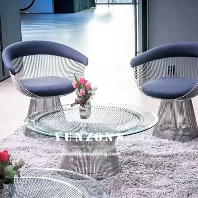 ভালো দাম বিলাসবহুল মধ্য শতাব্দীর আধুনিক অ্যাকসেন্ট গোলাকার প্ল্যাটনার কফি টেবিল ধাতব তারের বেস সহ টেম্পারেড গ্লাস শীর্ষ অনলাইন