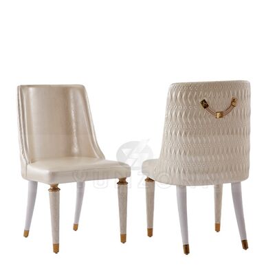 ভালো দাম হট সেল আধুনিক চামড়ার ডাইনিং চেয়ার ইনডোর ও আউটডোর ব্যবহারের জন্য হোটেল এবং লিভিং রুমের জন্য স্টেইনলেস স্টিলের আর্মরেস্ট সহ অনলাইন